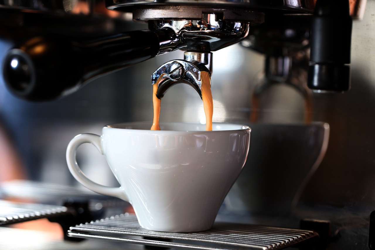 image of commercial espresso machine pulling shots os espresso